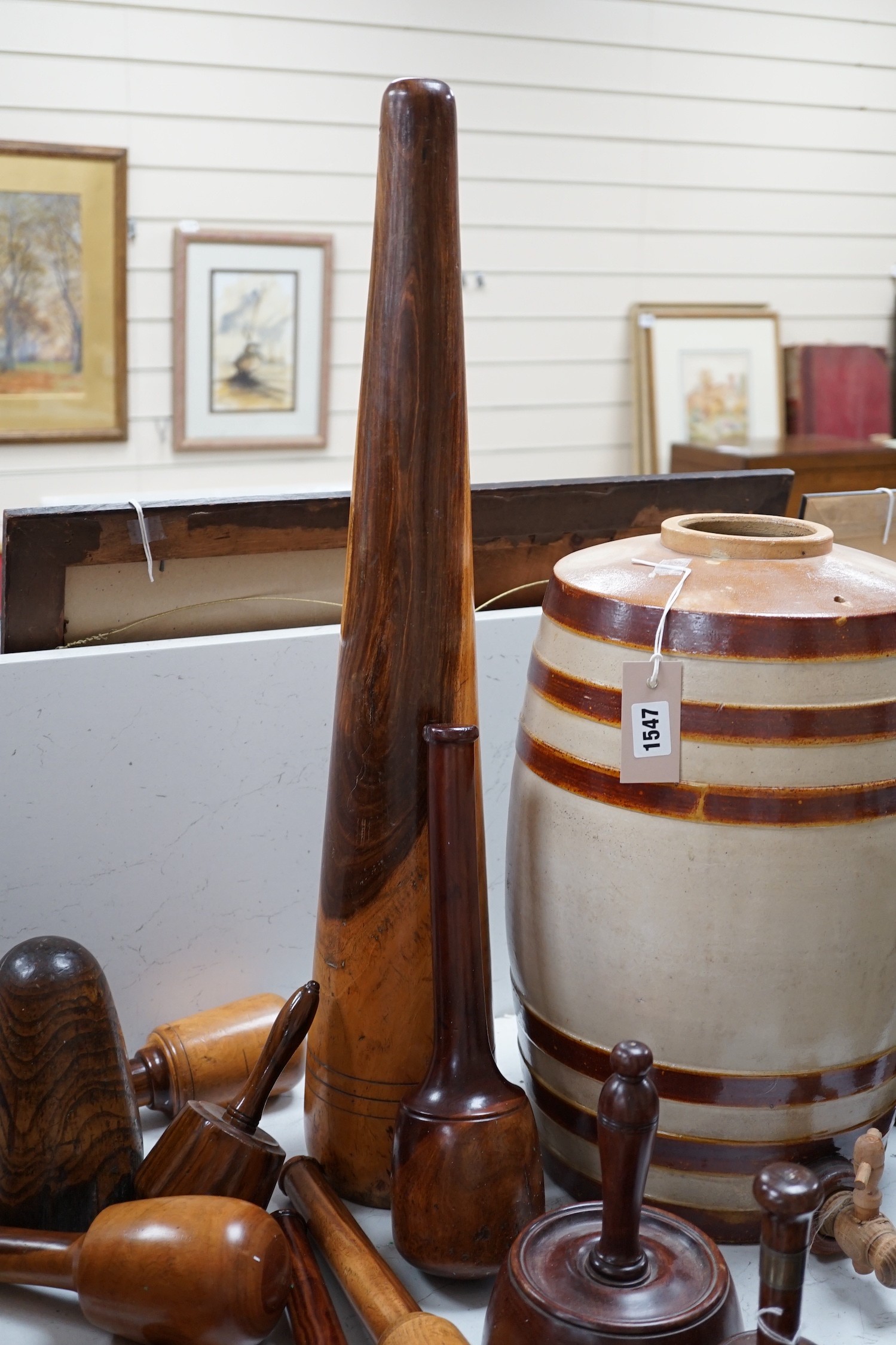 A mixed collection of treen leather and lead working tools etc. tallest 70cm